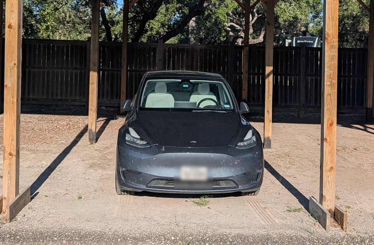 Car parked in a covered vehicle storage spot at Goose Island Park Storage